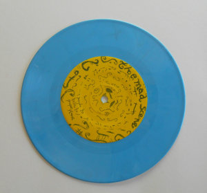 Light blue opaque 7 inch vinyl record
